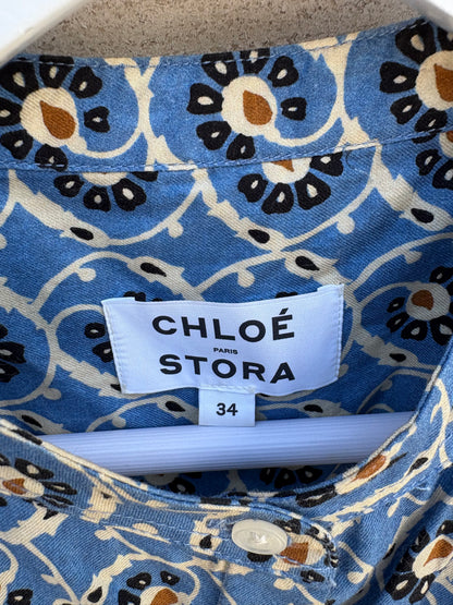 CHLOÉ STORA. Blusa azul estampada