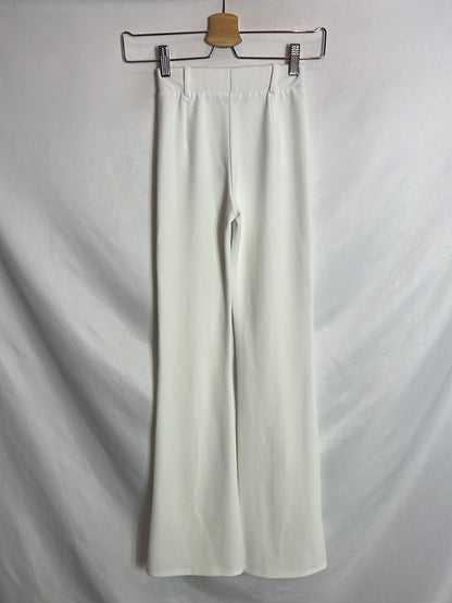 BERSHKA. White stretch flared trousers. XS