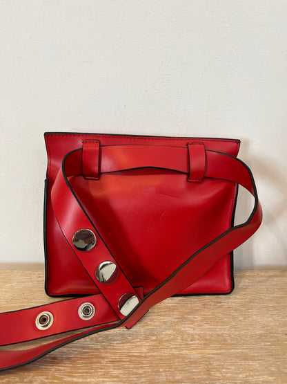 &OTHER STORIES. Riñonera tachuelas