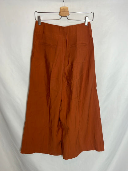 ZARA. Pantalón fluido culotte abotonado. T M