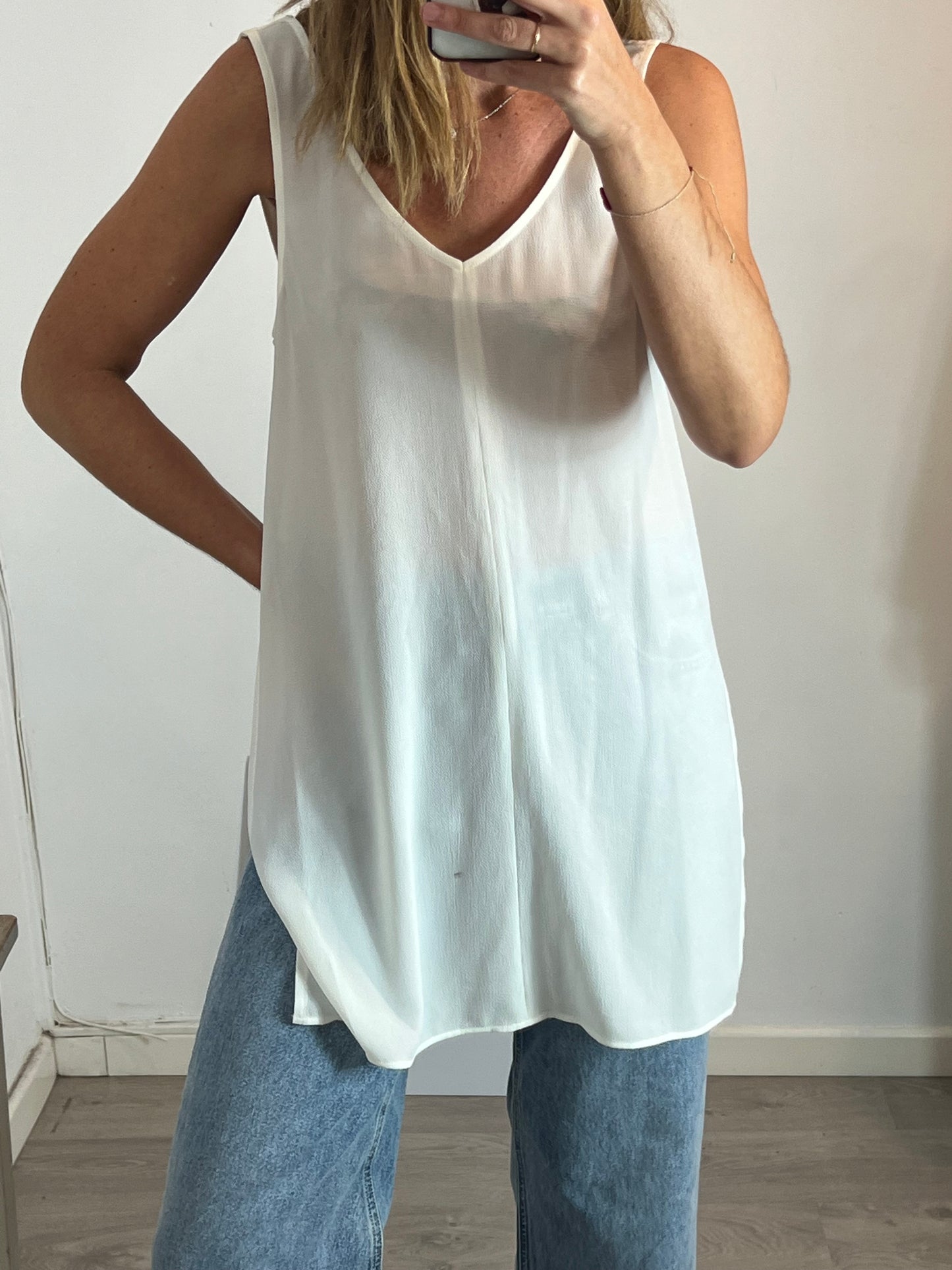 OTRAS. Top blanco fluido aberturas. T M/L