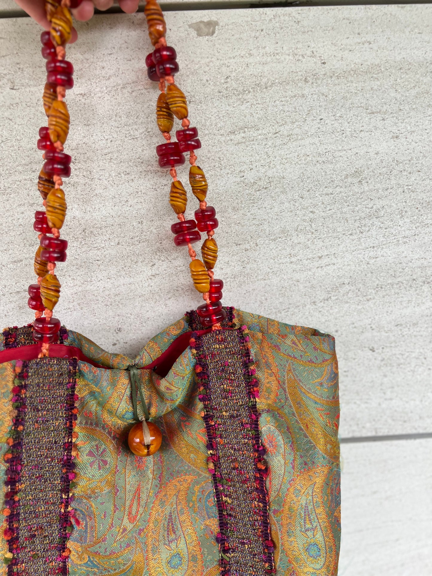 HELENE MENASCHE. Bolso estampado detalle asa