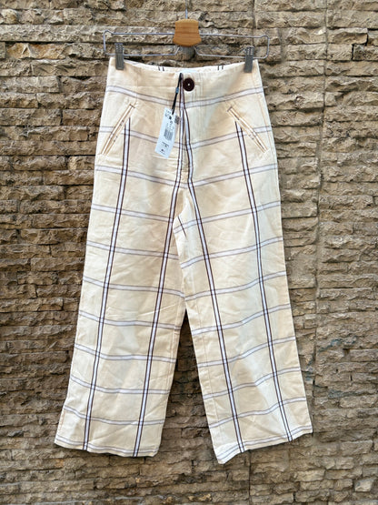SCALPERS. Pantalón beige cuadros. T S