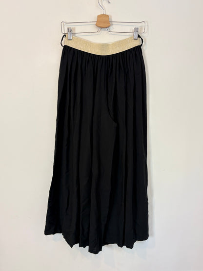 OTRAS. Pantalón fluido pata ancha