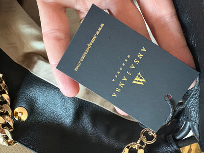 ANSA : ANSA Menorca. Bolso fruncido piel negro