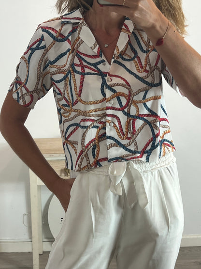 MANGO. String print blouse Ts