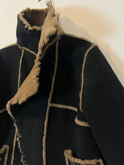 GILLES RICART. Black coat with fur Ts