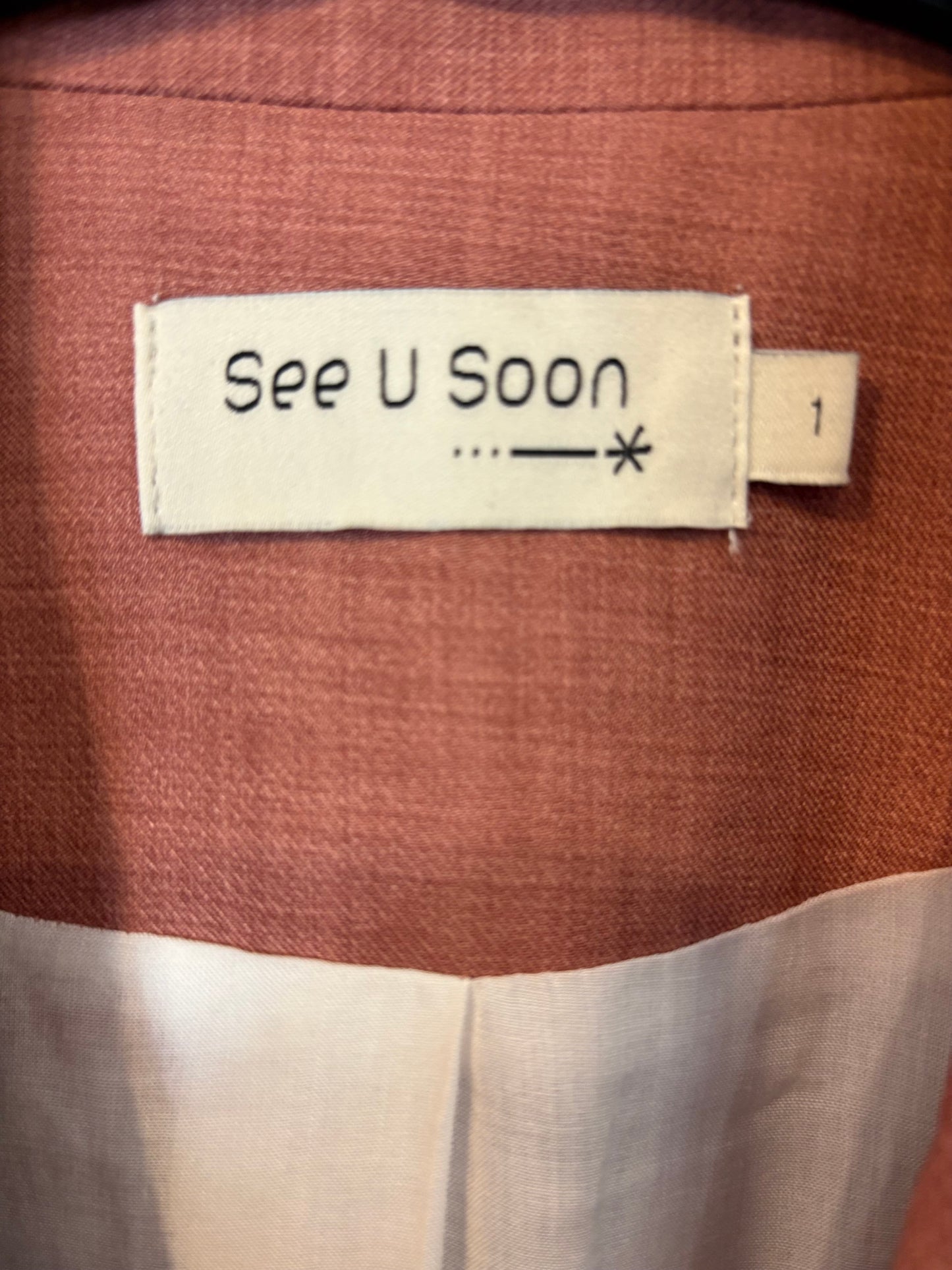 SEE U  SOON. Blazer rosa jaspeada