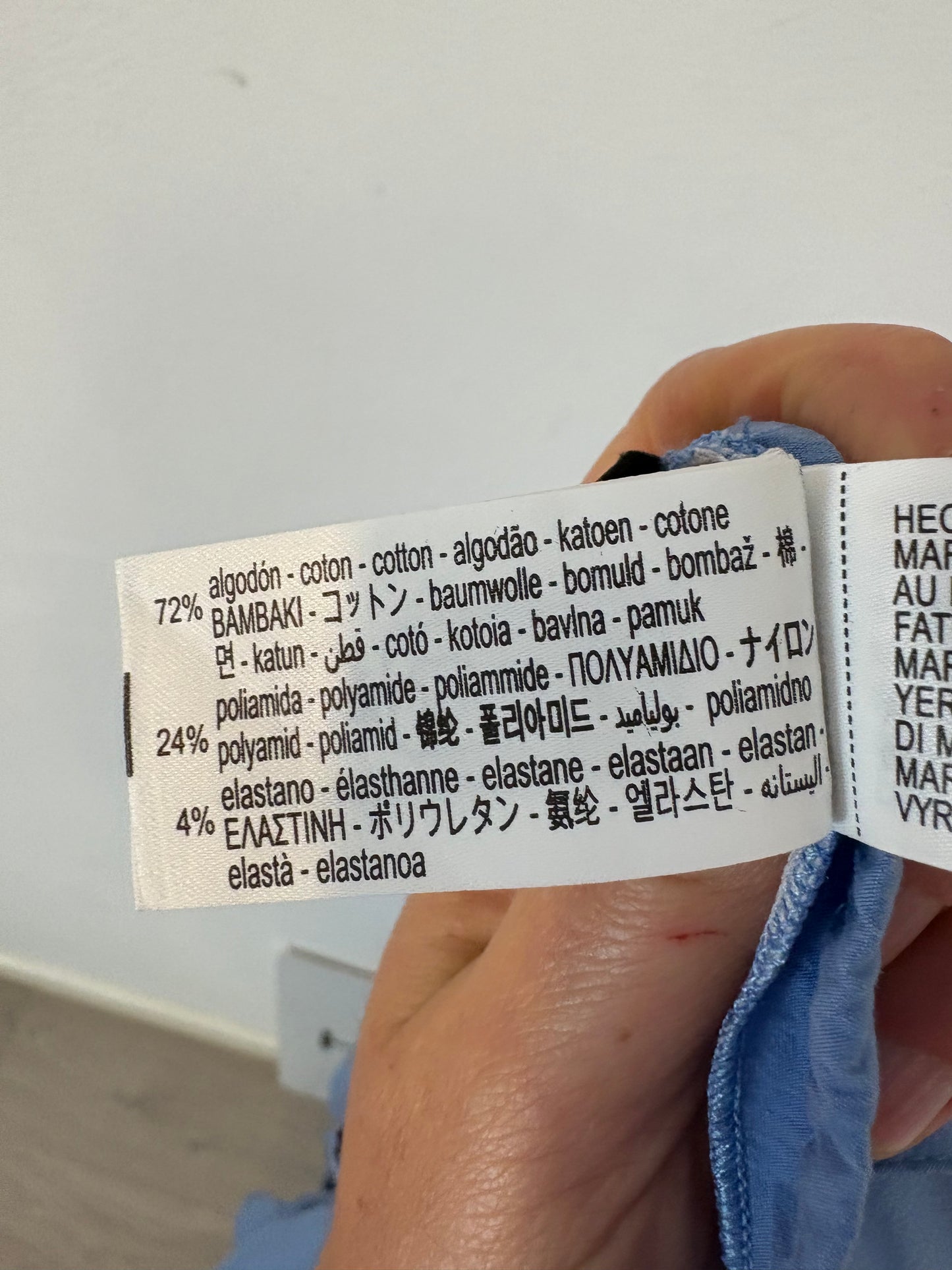 ZARA. Falda midi azul costuras