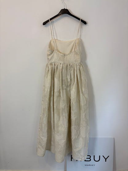 H&M. Vestido midi textura y vuelo. T XS