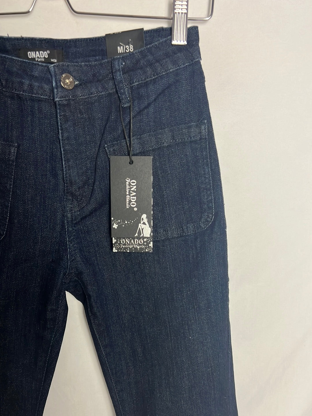 ONADO. Pantalón denim acampanado oscuros. T 38
