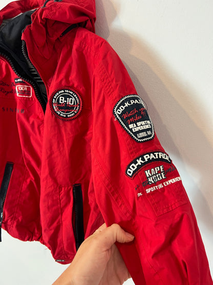 BASS 10. Parka roja impermeable T.6 años