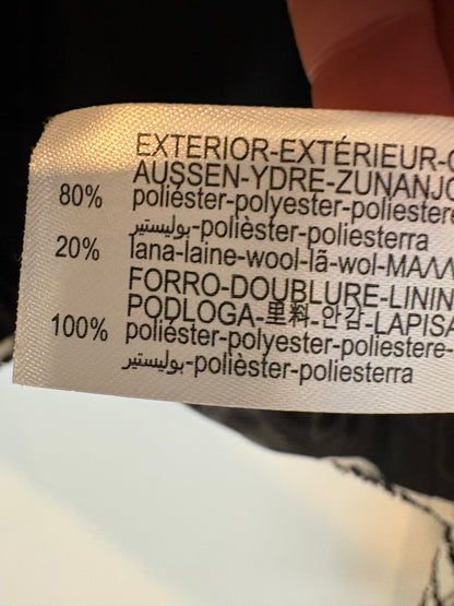 ZARA. Total look tweed blanco y negro