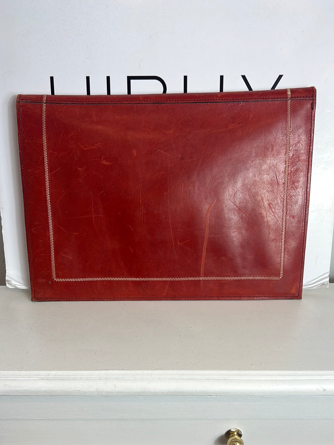 CHANTAL DE VASSIEU. Cartera de mano piel marrón