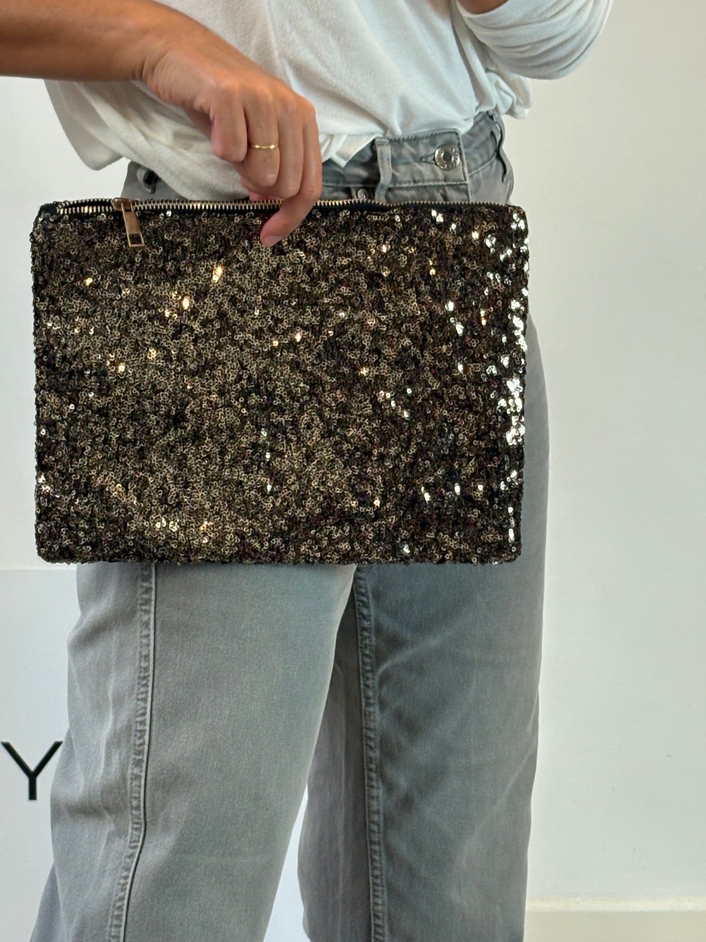 OTHERS. Mini sequin clutch bag