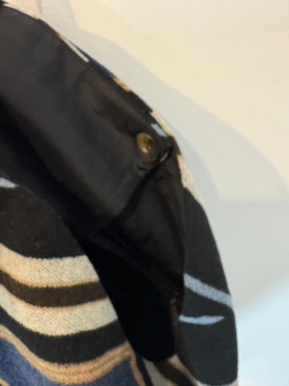 MI&CO. Falda midi rayas con lana