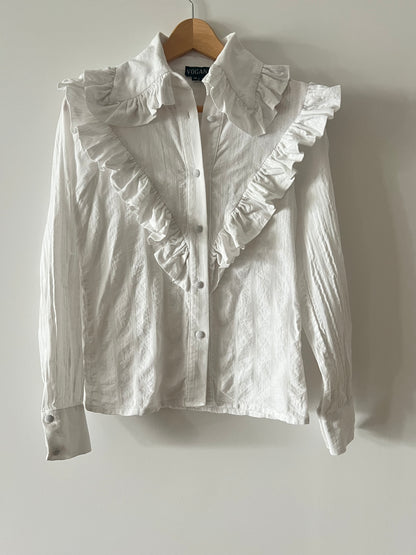 VOGANA. Blusa rayas cuello