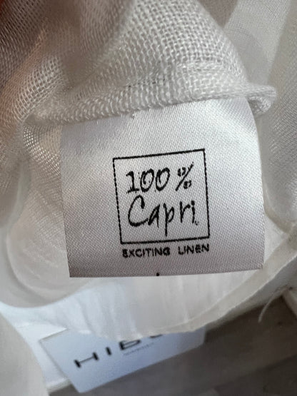 100% Capri. Linen blouse with neck and sleeve detail. TL