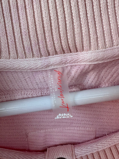 FREE PEOPLE MOVEMENT. Sudadera rosa claro textura