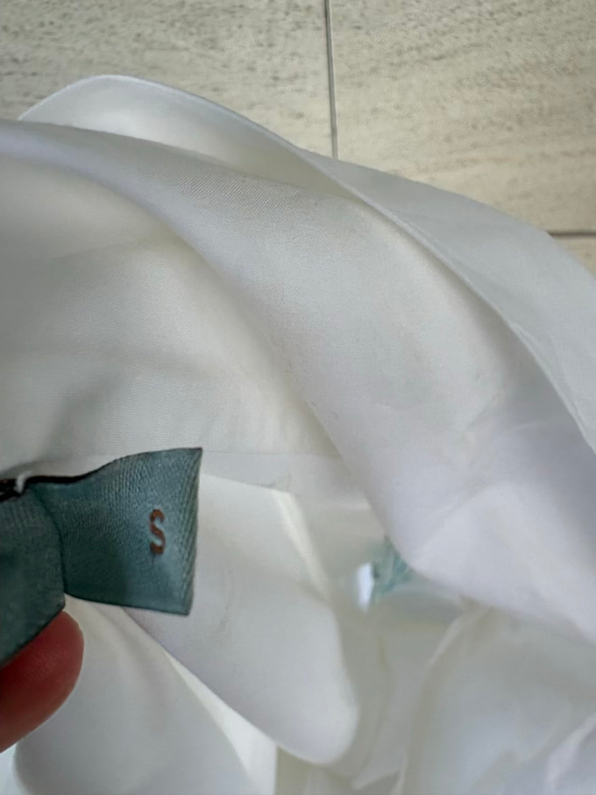 SILVIA TCHERASSI. Camisa blanca detalle mangas