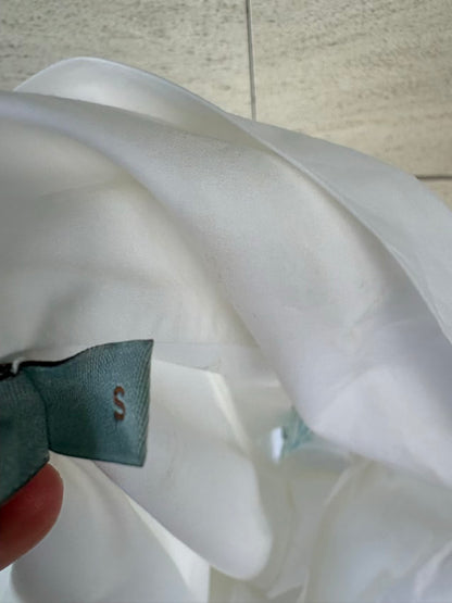 SILVIA TCHERASSI. Camisa blanca detalle mangas