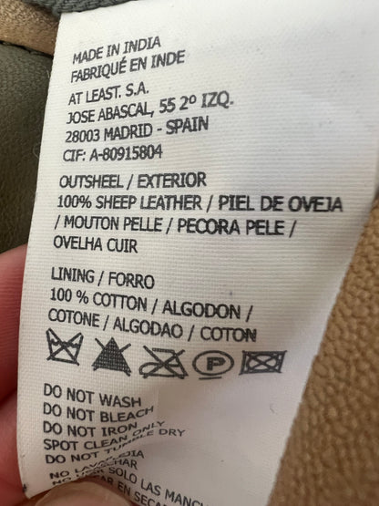 INTROPIA. Bolso piel plumas y flecos