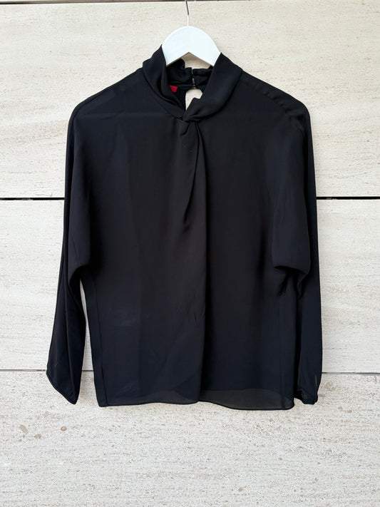 CAROLINA HERRERA. Blusa negra seda