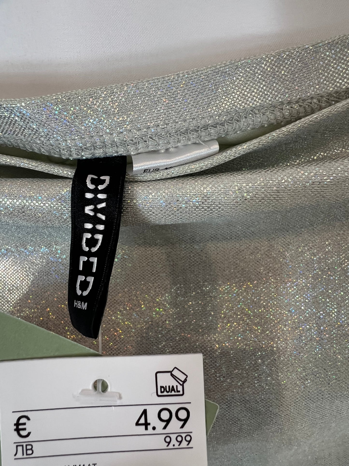 H&M. Top palabra de honor brillo. T M