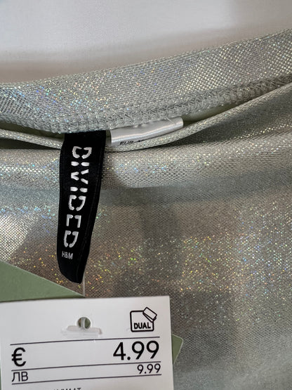 H&M. Top palabra de honor brillo. T M