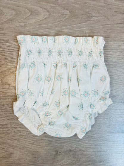 GOCCO. Cubrepañal blanco flores T.3/6 meses