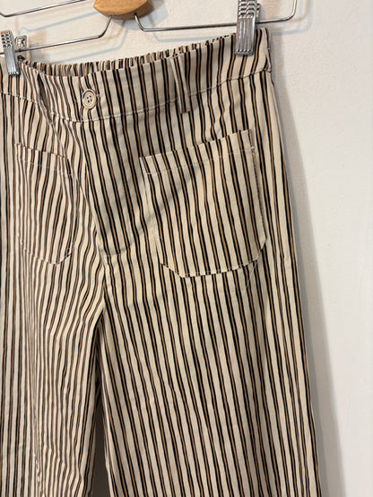 OTRAS. Pantalón rayas pata ancha
