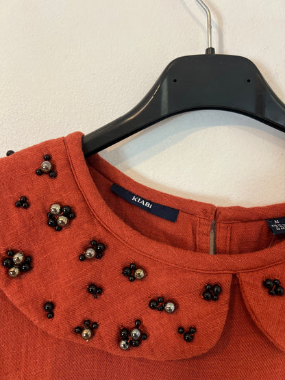 KIABI. Beaded tile blouse with TM collar
