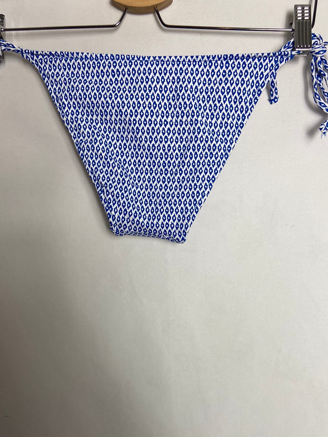 WOMEN´S SECRET. Braguita bikini azul tachuelas. T S