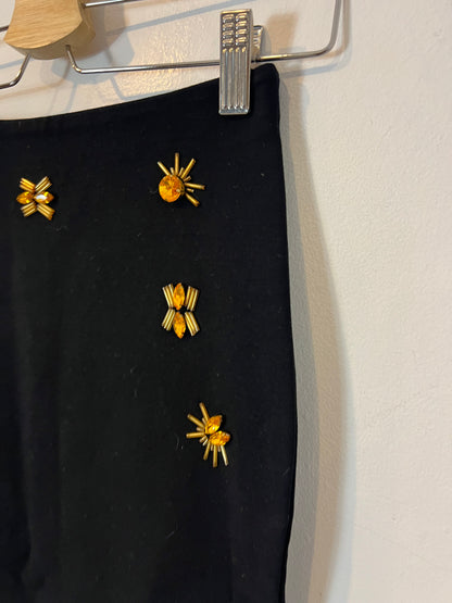 H&M. Falda tubo elástica abalorios. T XS