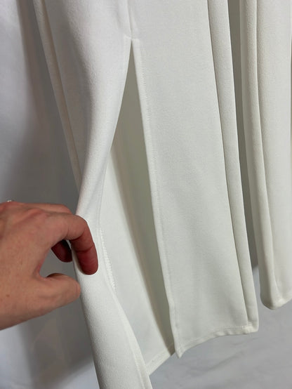 BERSHKA. White stretch flared trousers. XS