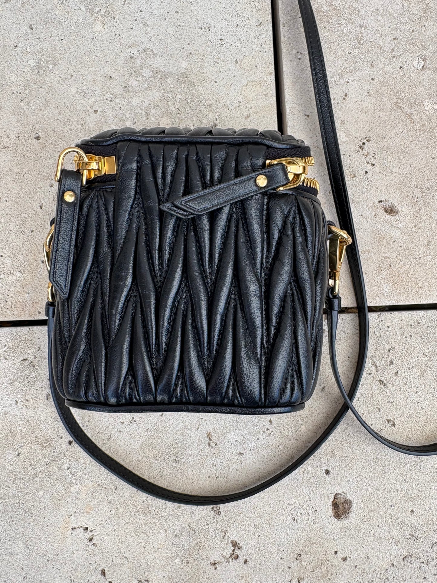 MIU MIU. Matelassé nappa leather micro bag