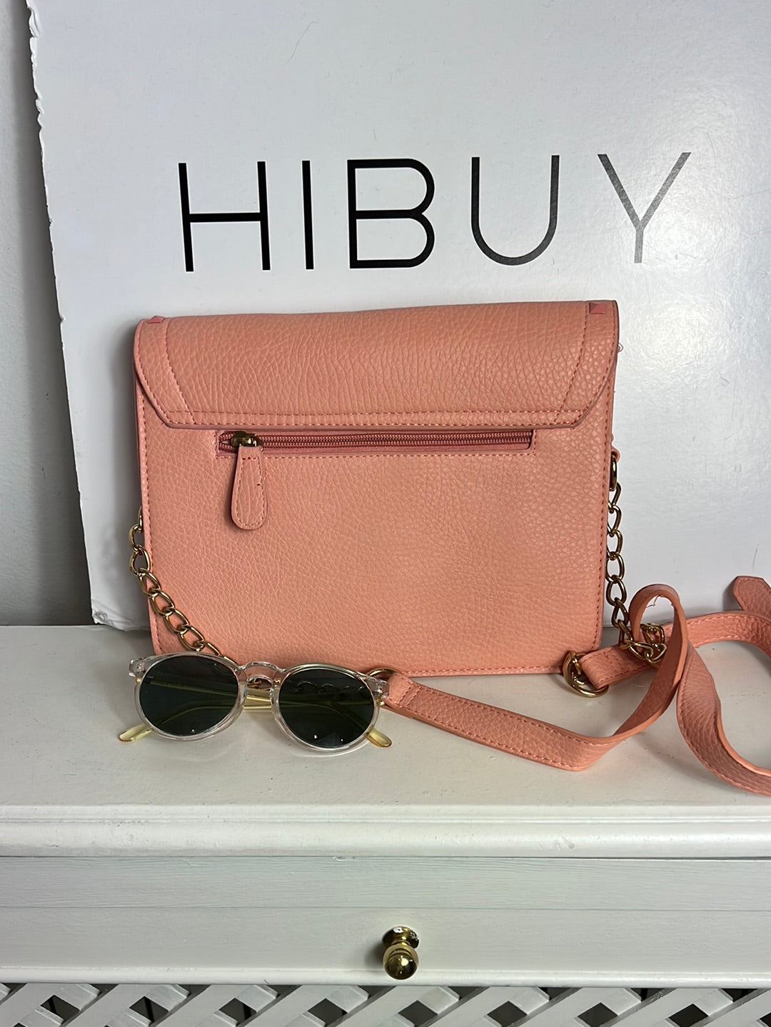 WHITE. Pink studded bag