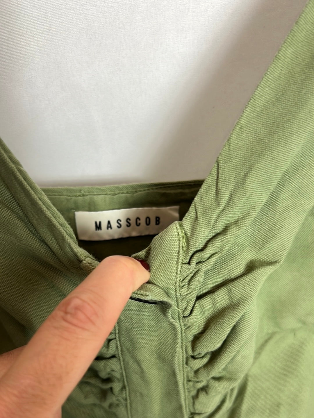 MASSCOB. Green button-down dress with smocking. TS