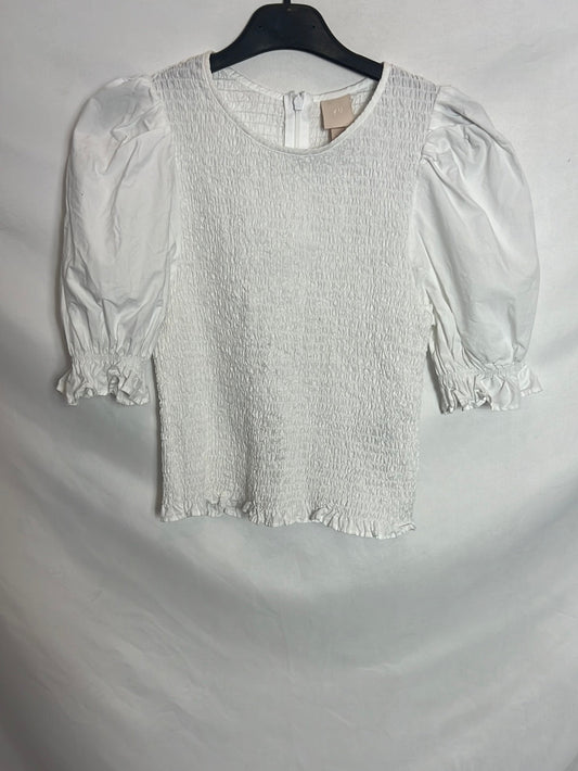 H&M. Top blanco nido de abeja. T 38