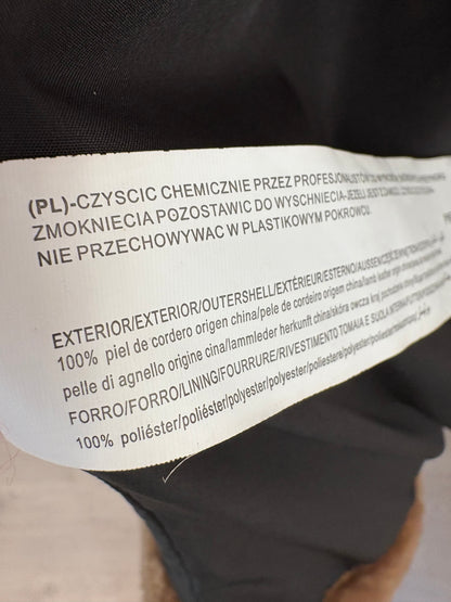 SFERA. Abrigo marrón pelo natural