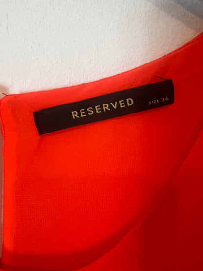 RESERVED. Top rojo fluido. T 36