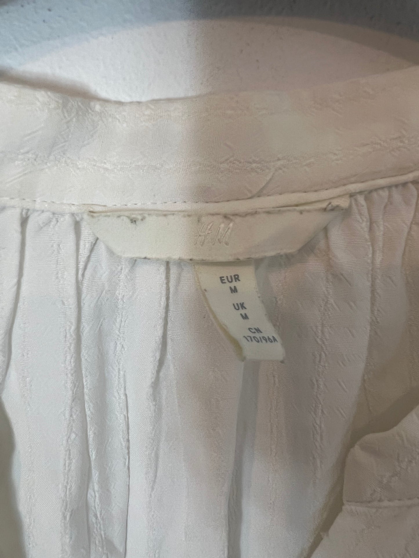 H&amp;M. White button-down blouse. TS