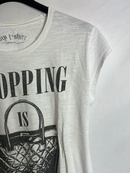 OTRAS. Camiseta blanca slogan. TS/M