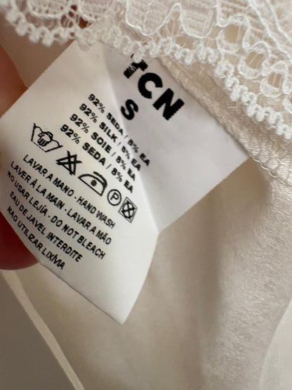 TCN. Blusa seda encaje