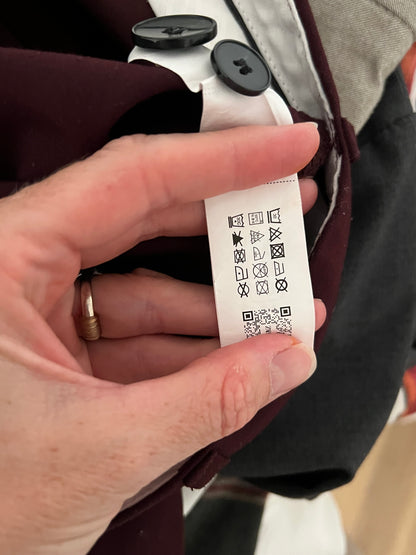 ZARA. Pantalón ancho burdeos pinzas