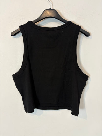 H&M. Top negro canalé