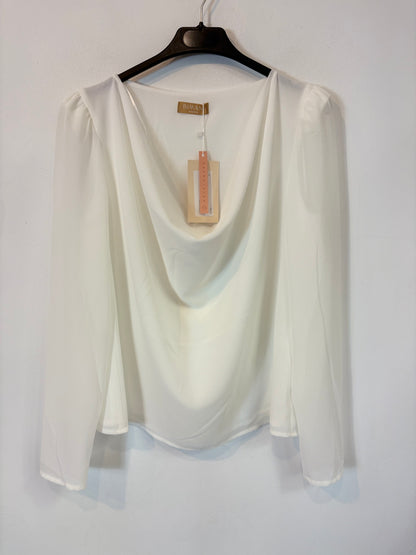 BIMANI. Blusa blanca escote fluido
