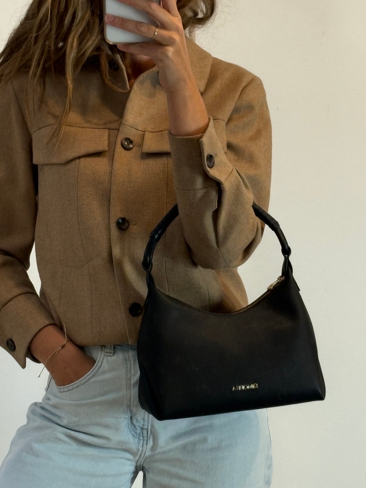 SIMORRA. Black leather bag