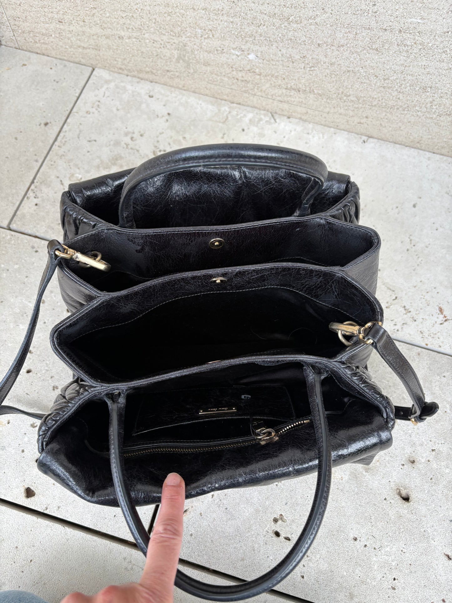 MIU MIU. Bolso matelassé piel negro