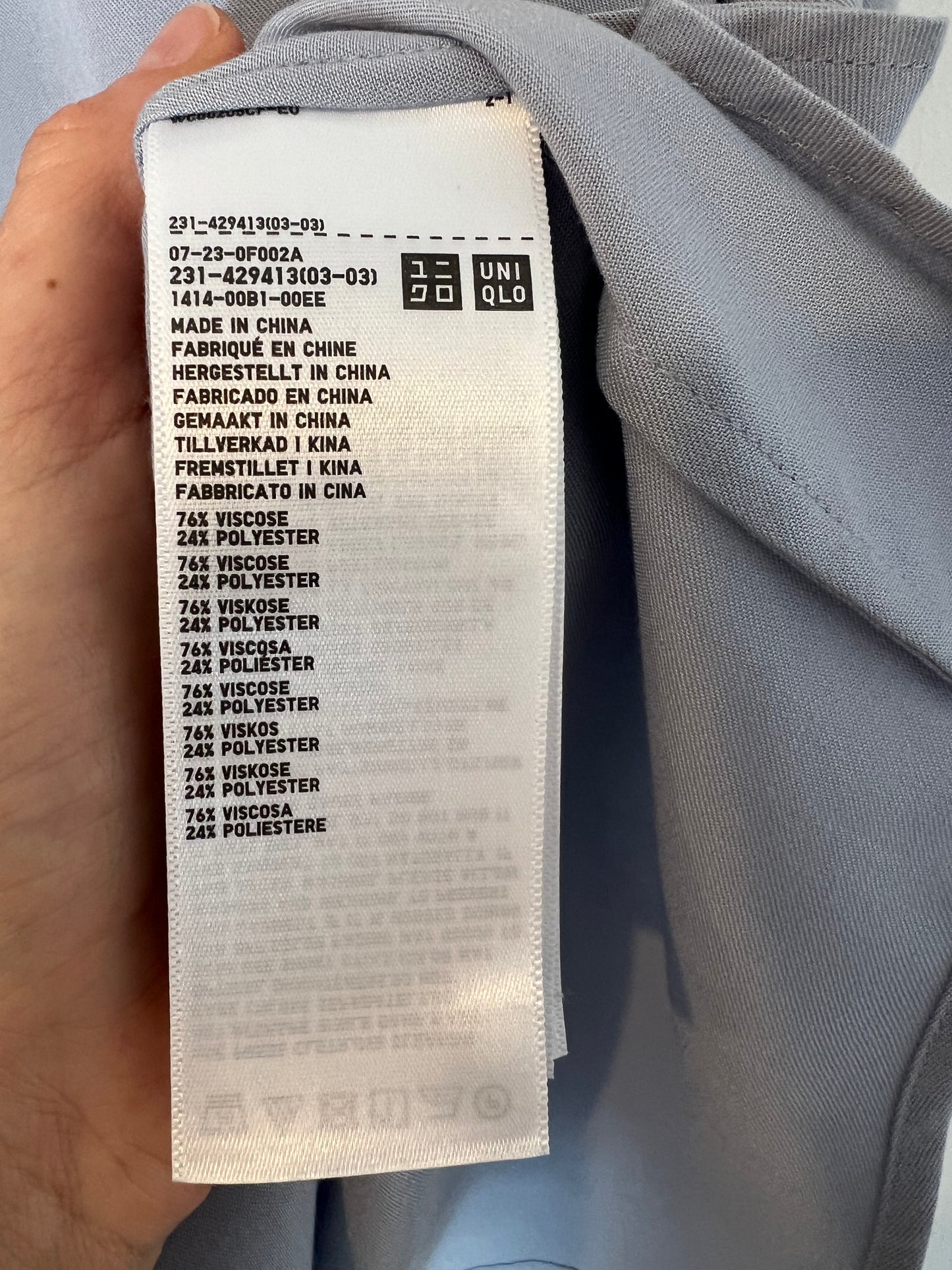 UNIQLO. Blusa fluida azul claro T XS